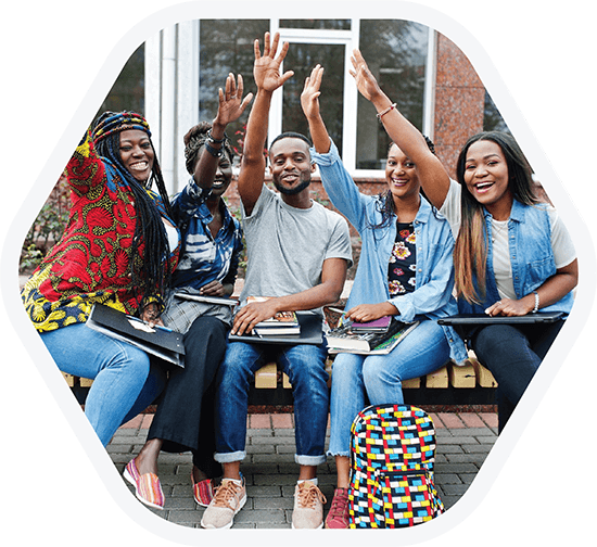 A group of students happy while studying together